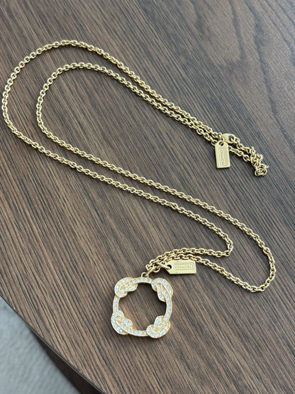 Cute Vintage COACH Gold Plated Pave Crystal Infinity Knot Pendant Necklace Long
