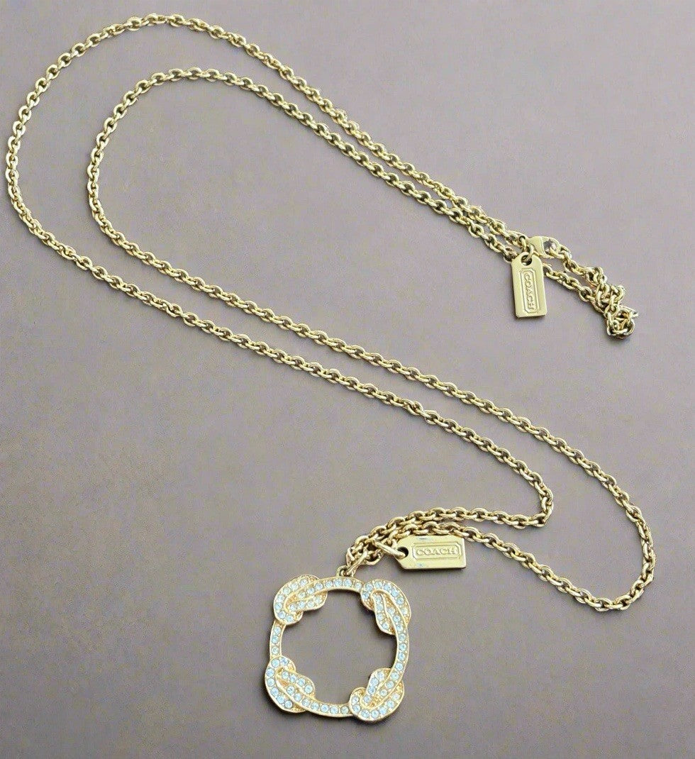 Cute Vintage COACH Gold Plated Pave Crystal Infinity Knot Pendant Necklace Long