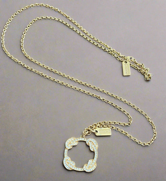 Cute Vintage COACH Gold Plated Pave Crystal Infinity Knot Pendant Necklace Long