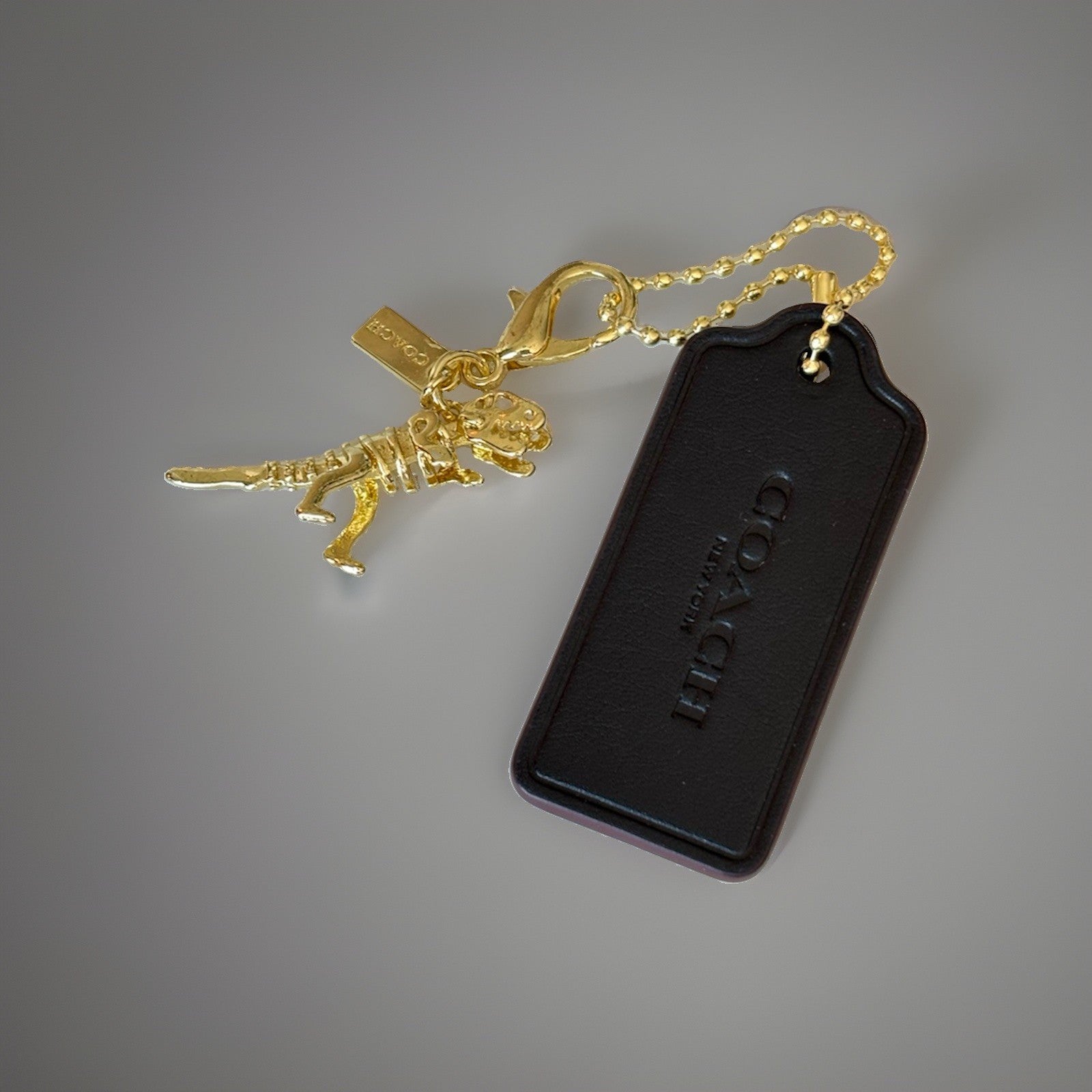 COACH New York Designer REXY Hang Tag Dino Bag Charm Fob Chain Gold/Black/Maroon