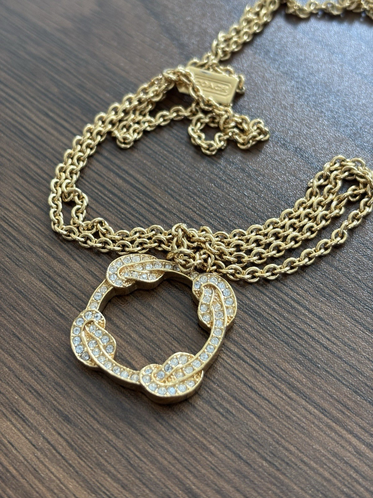 Cute Vintage COACH Gold Plated Pave Crystal Infinity Knot Pendant Necklace Long