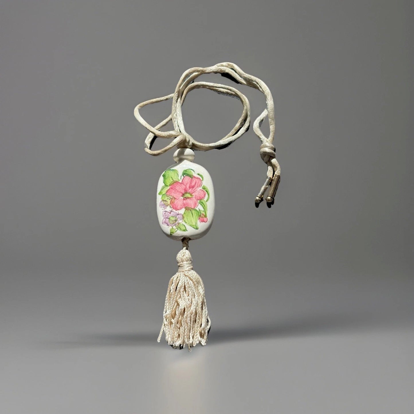 Vtg AVON Hand Painted Floral Ceramic Pendant Necklace W/Tassel & Silk Cord 1980