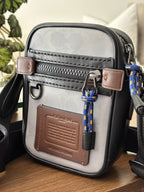 COACH Designer Reflective Signature C Crossbody “Dylan 10” Travel Bag (org $350)
