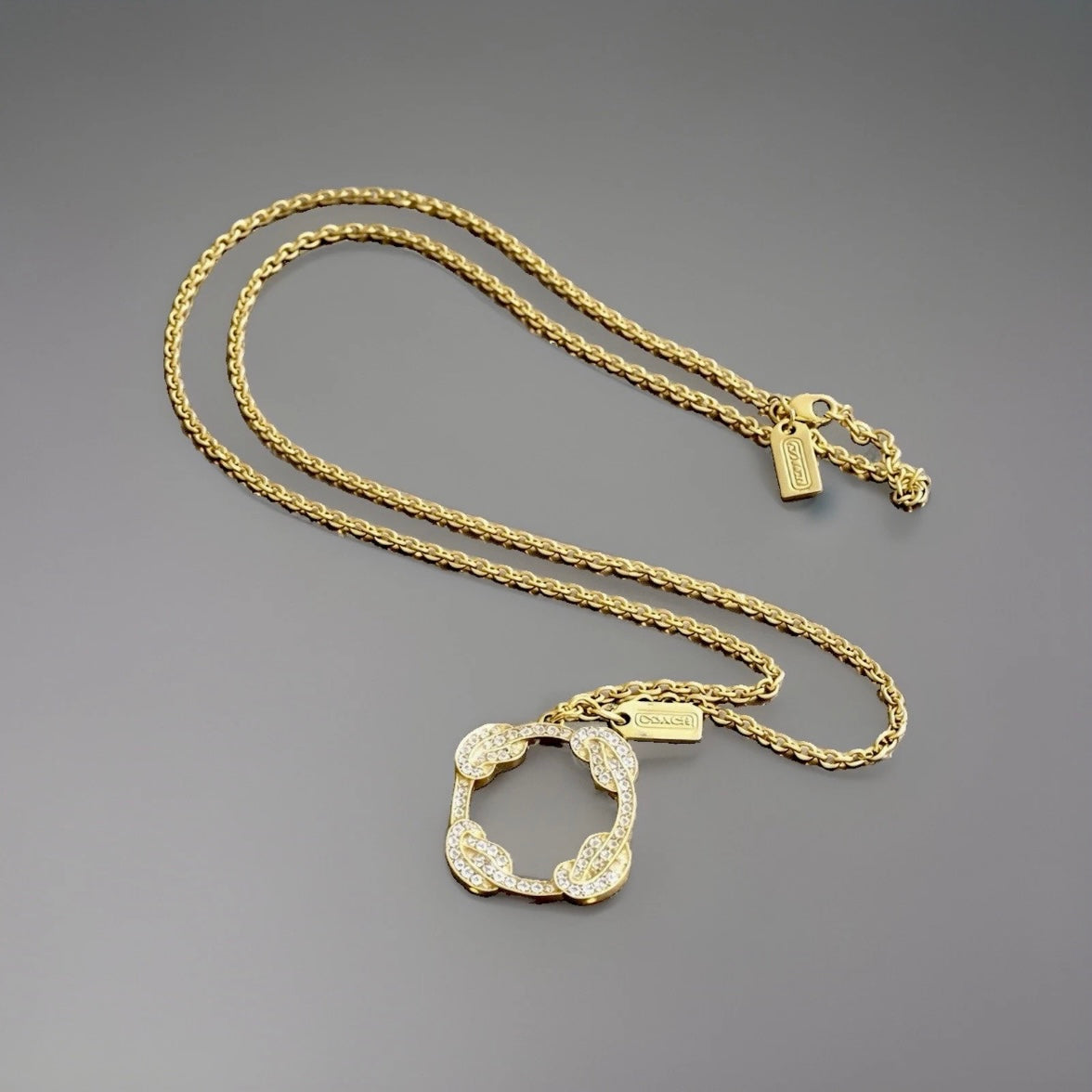COACH Vintage Gold Plated Pave Crystal Knot Pendant Long Necklace (org $125)